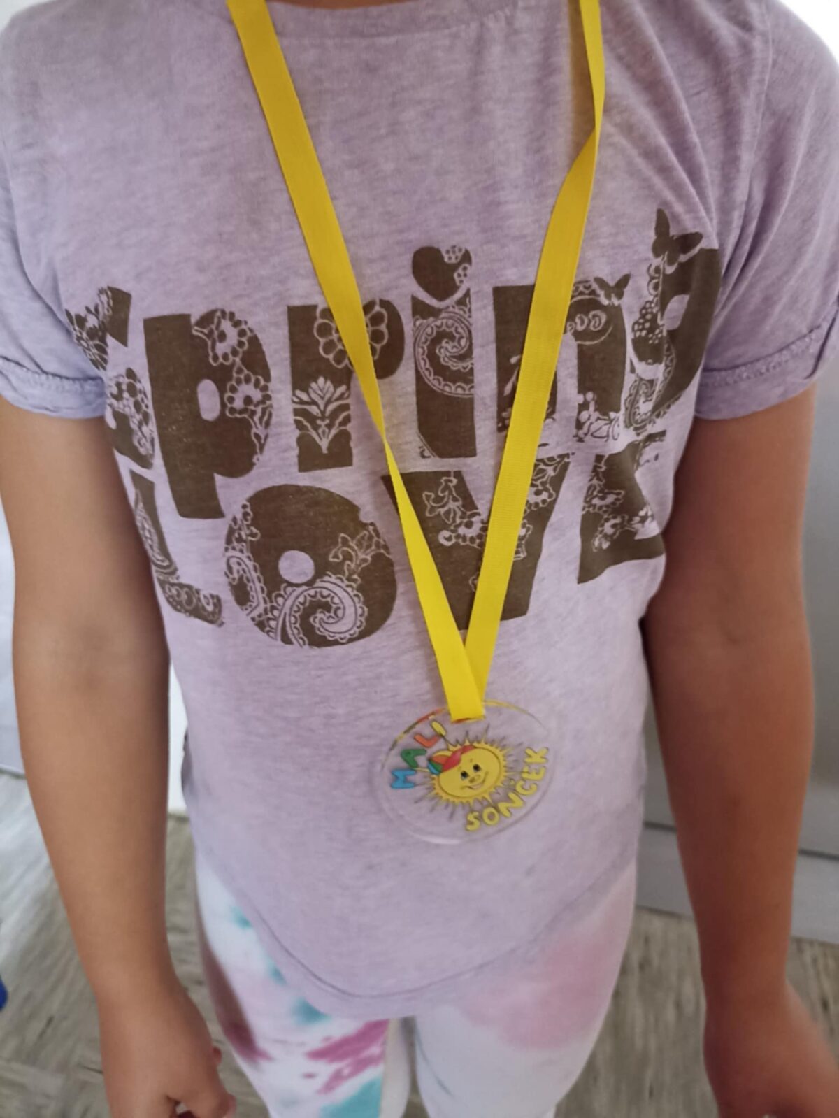 Medalja – nagrada za opravljene vse stopnje programa Mali sonček