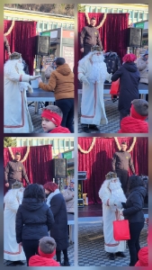 Stisk roke in izročitev darila